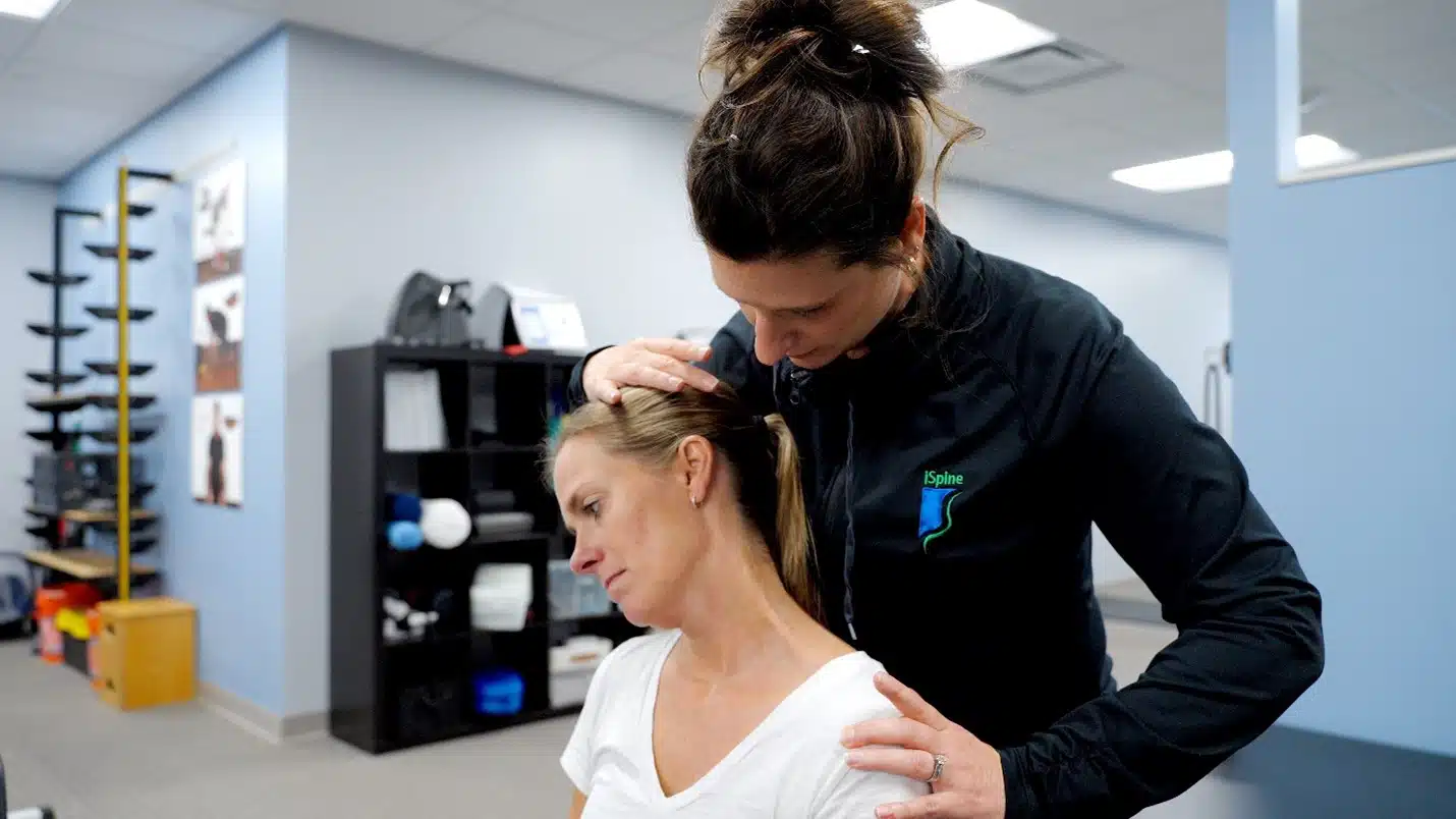a clinician hands-on manipulating a patient on a table joint mobilization increases function and range of motion